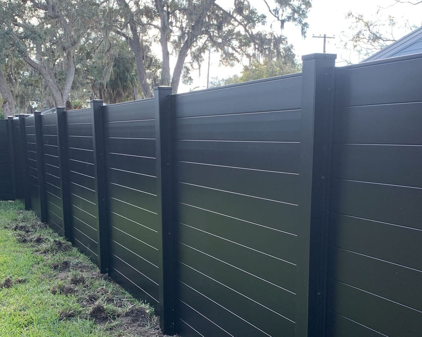 Black aluminum slat horizontal privacy fence