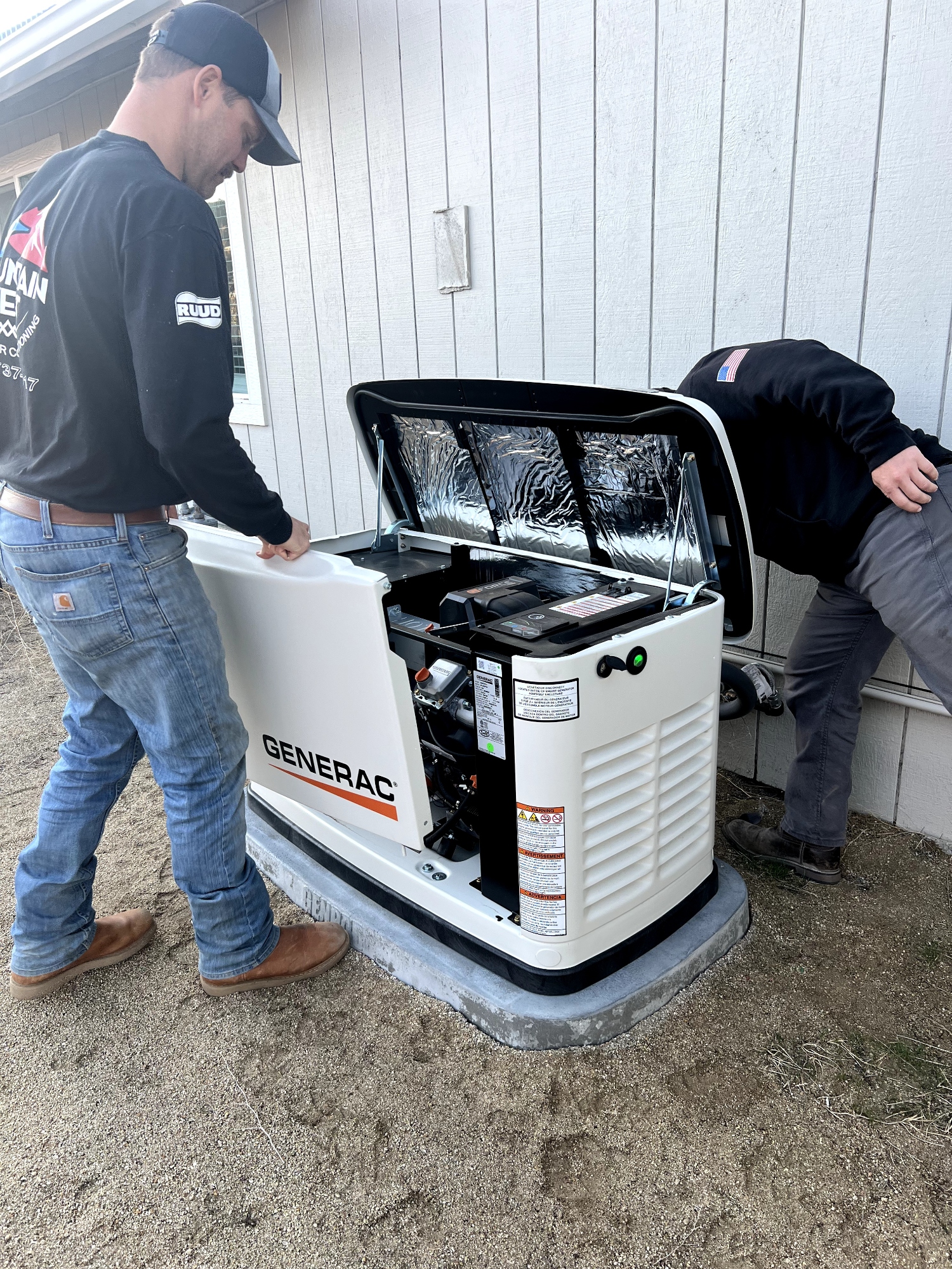 Tech installing a Generac whole-home generator